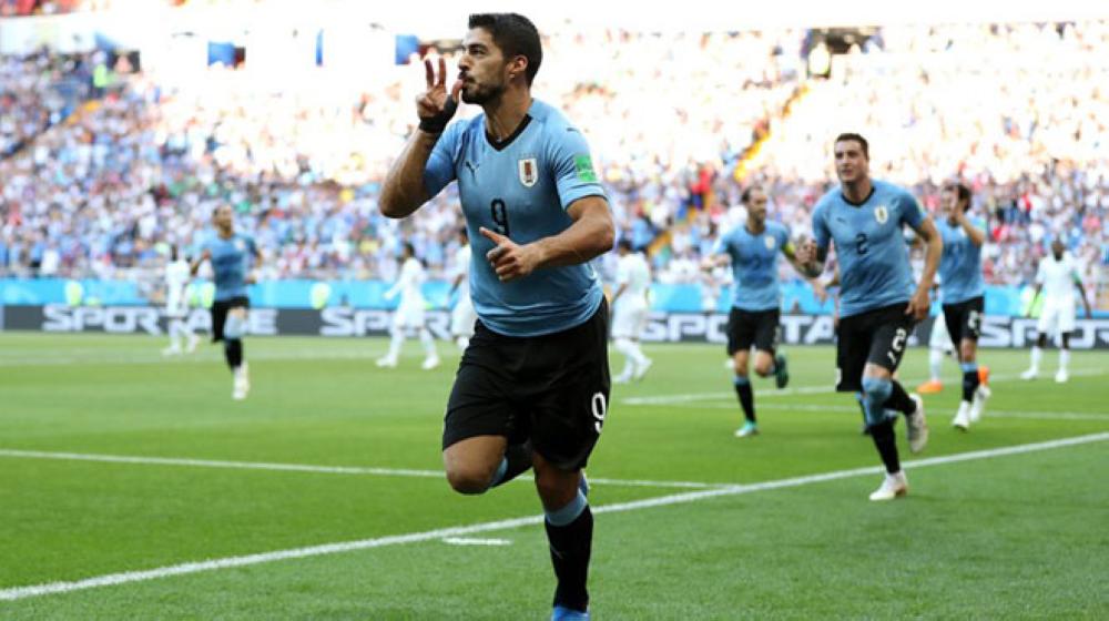 أوروجواي تفوز على روسيا بثلاثية نظيفة
